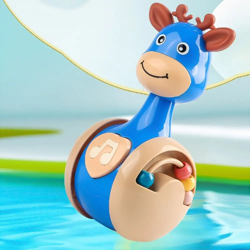 Creative Fawn Sliding Tumbler Early Education Cartoon Dinosaurs Tumbler Wobbler Musical Press Squeaky Tumbler Rocking