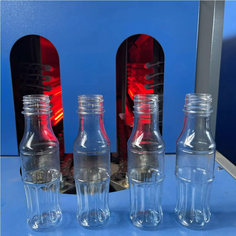 Semi Automatic Plastic PET Bottle Making Machine 4 Cavities Plastic Bottle Blowing Machine Bottle Blower for Craft Beverage