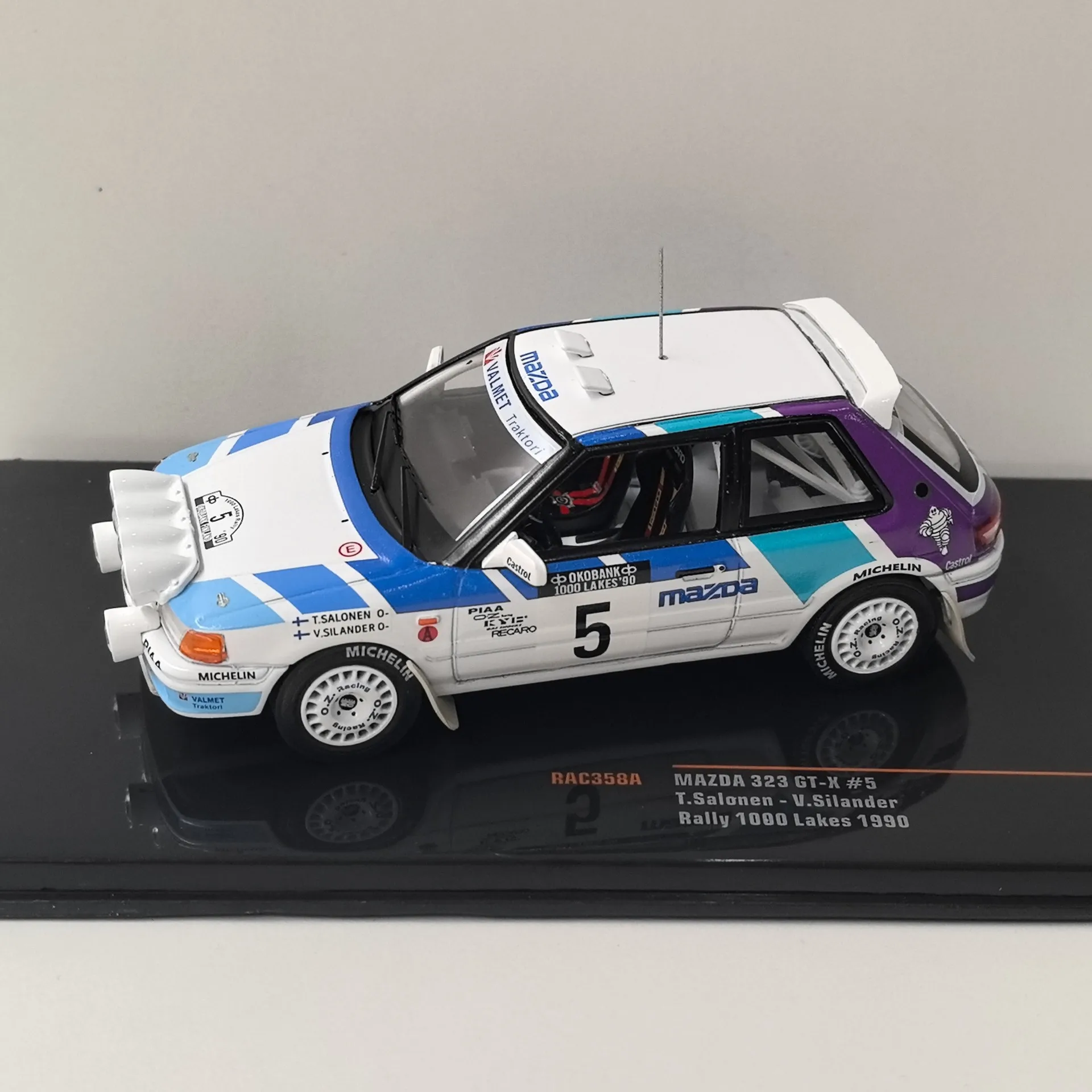 

Diecast IXO 1/43 Scale MAZDA 323 GT-X #5 1990 Mazda Racing Alloy Car Model Collectible Toy Gift Souvenir Display Ornament