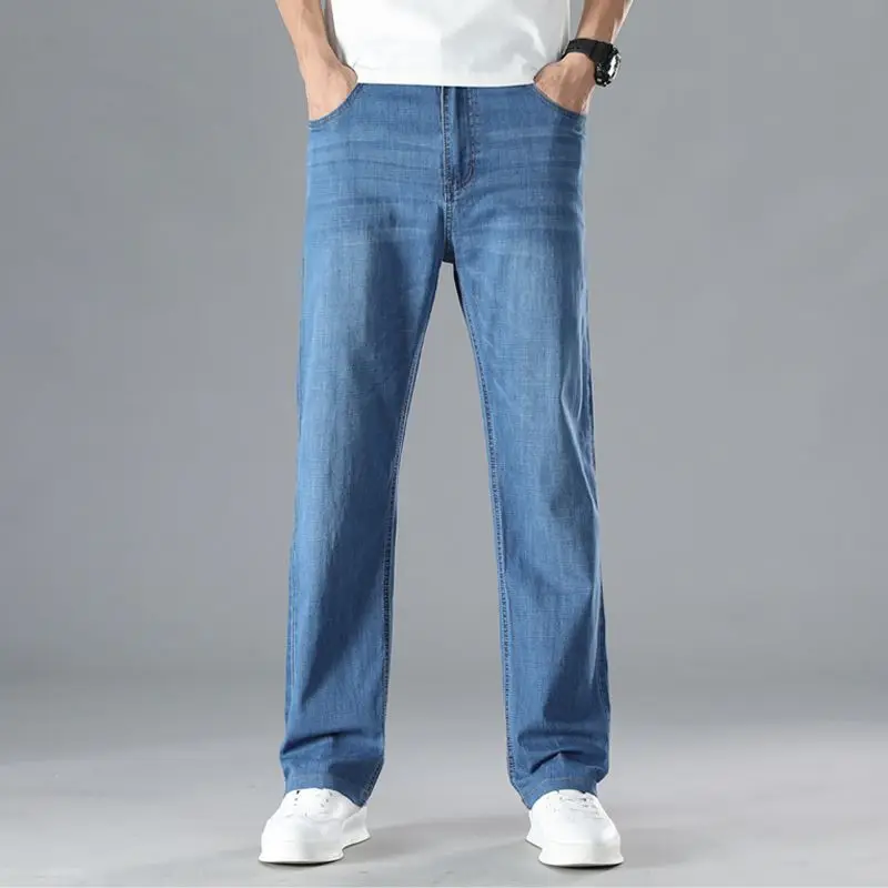 Men's blue plus size jeans weighing 300 pounds can be worn in autumn and winter thick high waisted slightly elastic jeans