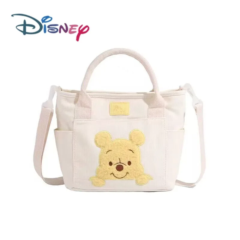 2024 New Disney Cute Cartoon Winnie the Pooh Canvas Crossbody Bag Doll Portable Handheld Crossbody Two-Purpose Bag