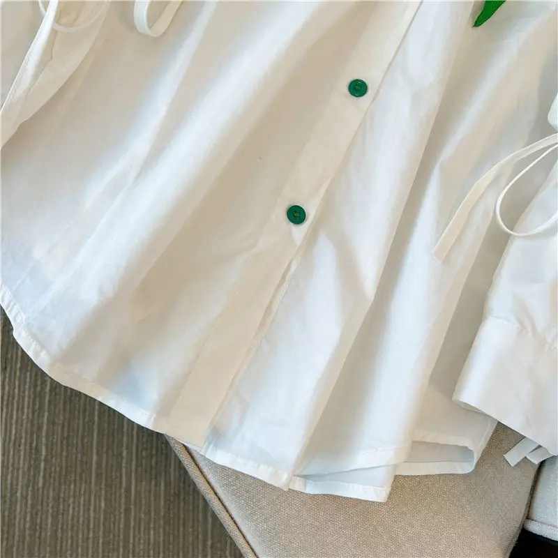 2025 outono novo grande pescoço apontado chique nicho solto casual branco emenda camisa feminina de manga comprida peter pan colarinho topo