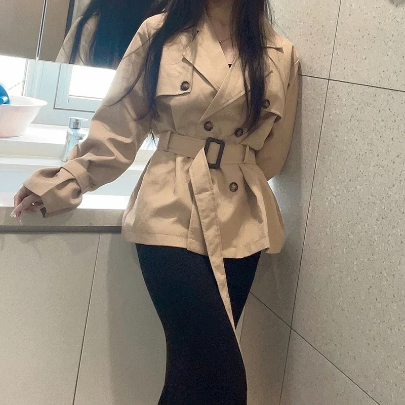 Korean advanced windbreaker women's autumn and winter new fashion temperament waist slim double-breasted lapel long coat.