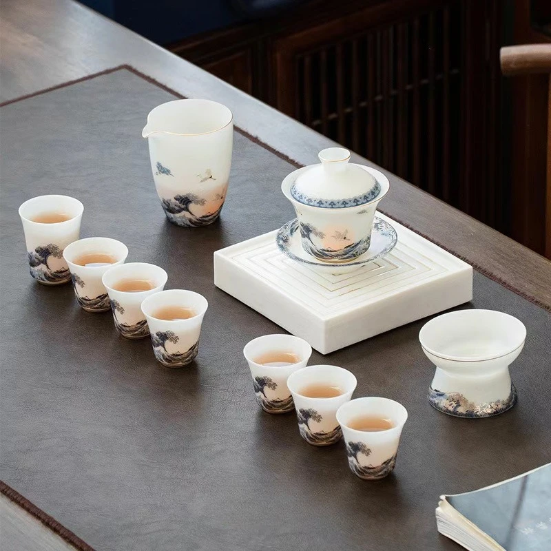 Light luxury ice jade porcelain plain-fired high-end Dehua suet jade white porcelain tea set Kung fu teacup wave cover bowl