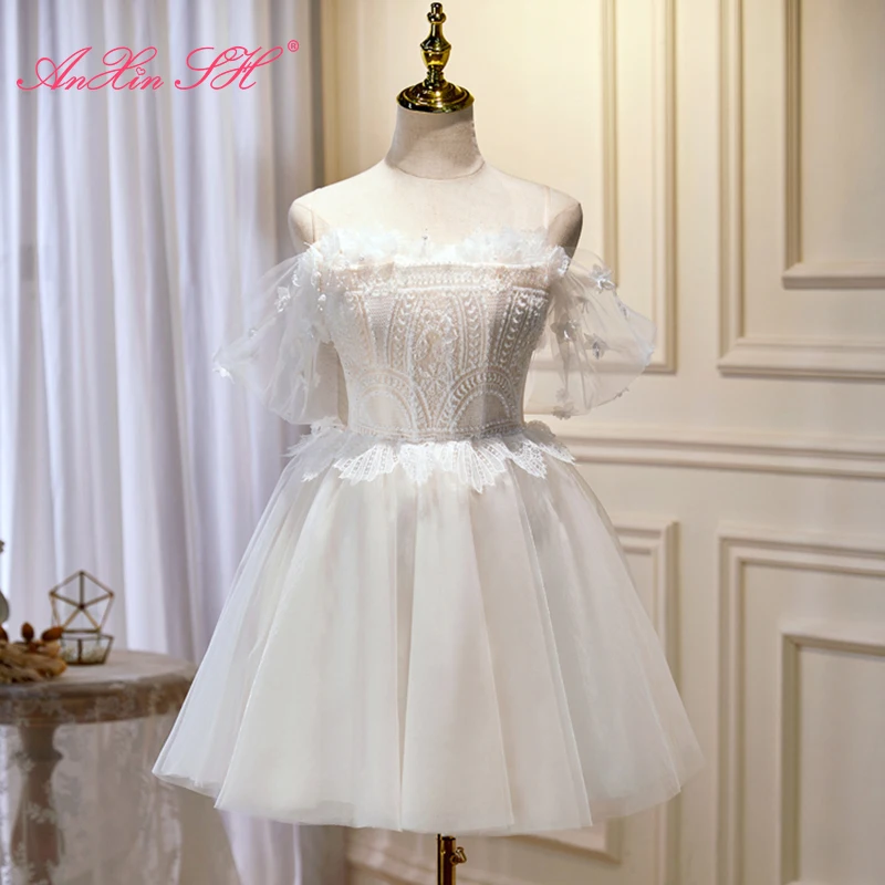 AnXin SH princesa encaje blanco correa de espagueti rebordear flor encaje hasta volantes vestido de noche corto personalizado pequeño vestido blanco