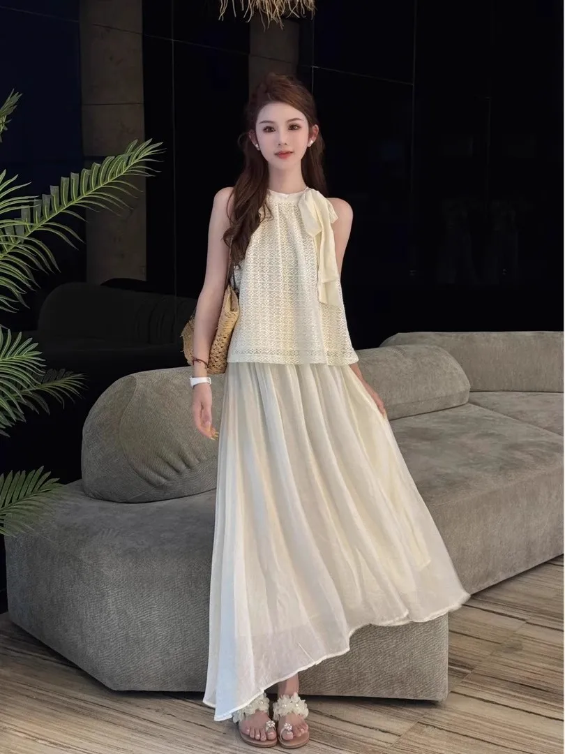 

Модный универсальный комплект из юбки миди с высокой талией и элегантного жилета-халтера в корейском стиле