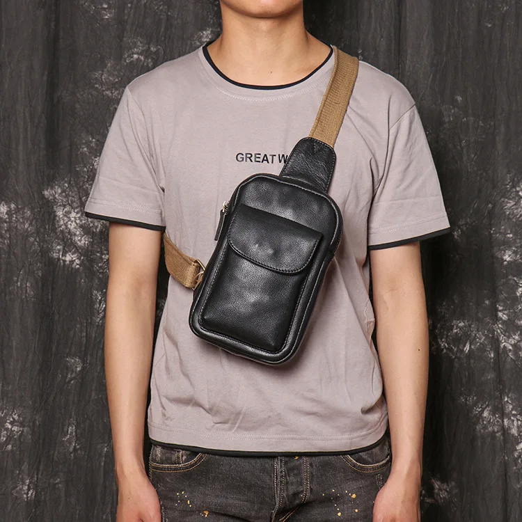 Men's multi-function mobile phone storage women's real leather shoulder diagonal cross backpack large capacity chest bag