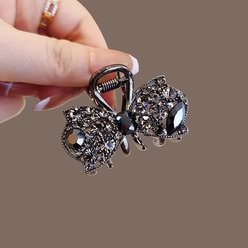 Exquisite hohle schwarze Strass-Haarspange mit Schleife, High-End-Haargreifer, niedlich, süß, für Damen, Hinterkopf, selbstgebundene Haarklammer, Legierung