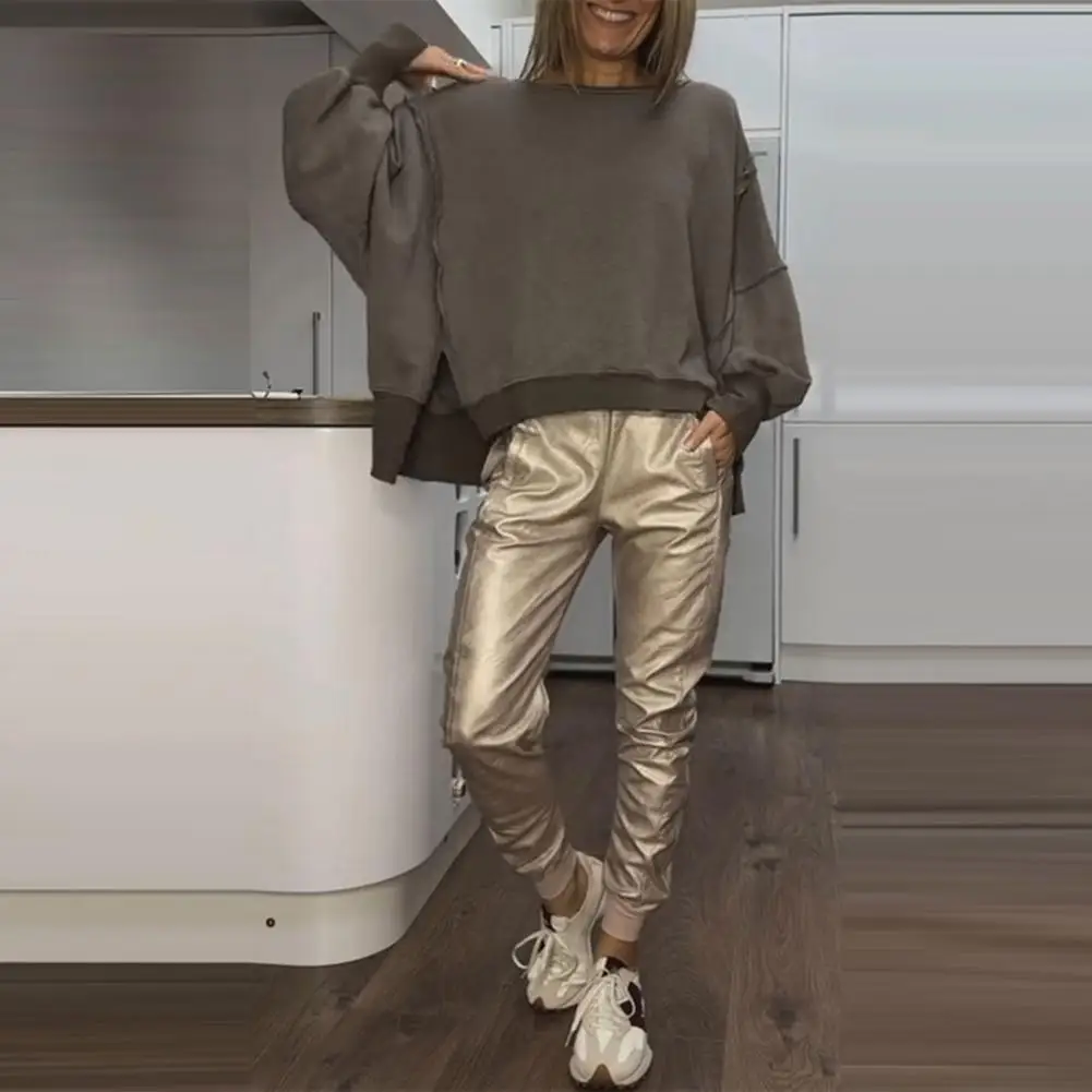 

Весенний комплект из 2 шт./компл., комплект брюк-свитшот для женщин, топ с разрезом по подолу и круглым вырезом, брюки с ремешком на щиколотке, однотонный повседневный женский спортивный костюм