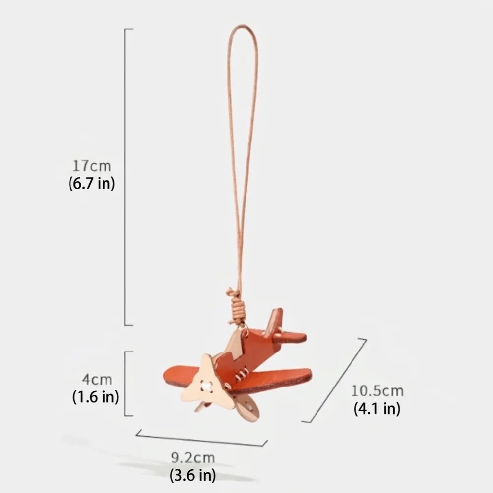 Echter Leder-Flugzeug-Schlüsselanhänger, glatte Textur, leichter Taschenanhänger, raffiniertes Mini-Flugzeug-Design, Auto-Hängeornament – Detail 1