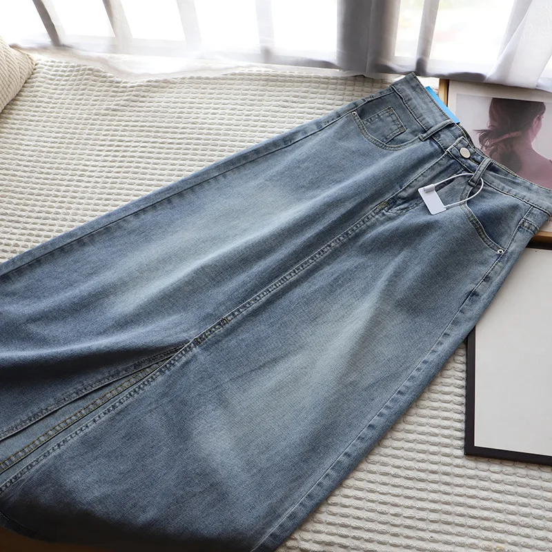 

Светло-голубая джинсовая юбка А-силуэта женская летняя новая с высокой талией, утягивающая, с разрезом, средней длины, ниже колена