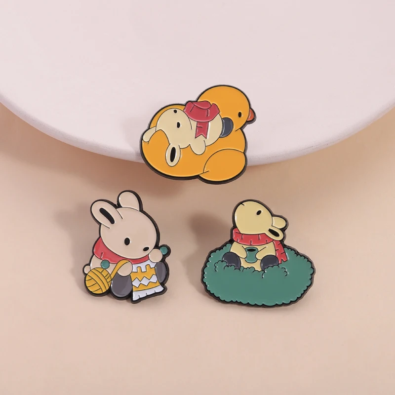 Rabbit Enamel Pin Cute Healing Style Bunny Knitting Resting Playing with Duck Toy Brooches for Backpack Jacket Gift