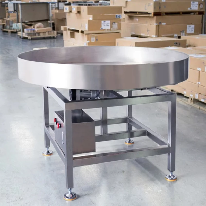 

Descrambler and sorter turntable rotary accumulator for efficient food processing lines