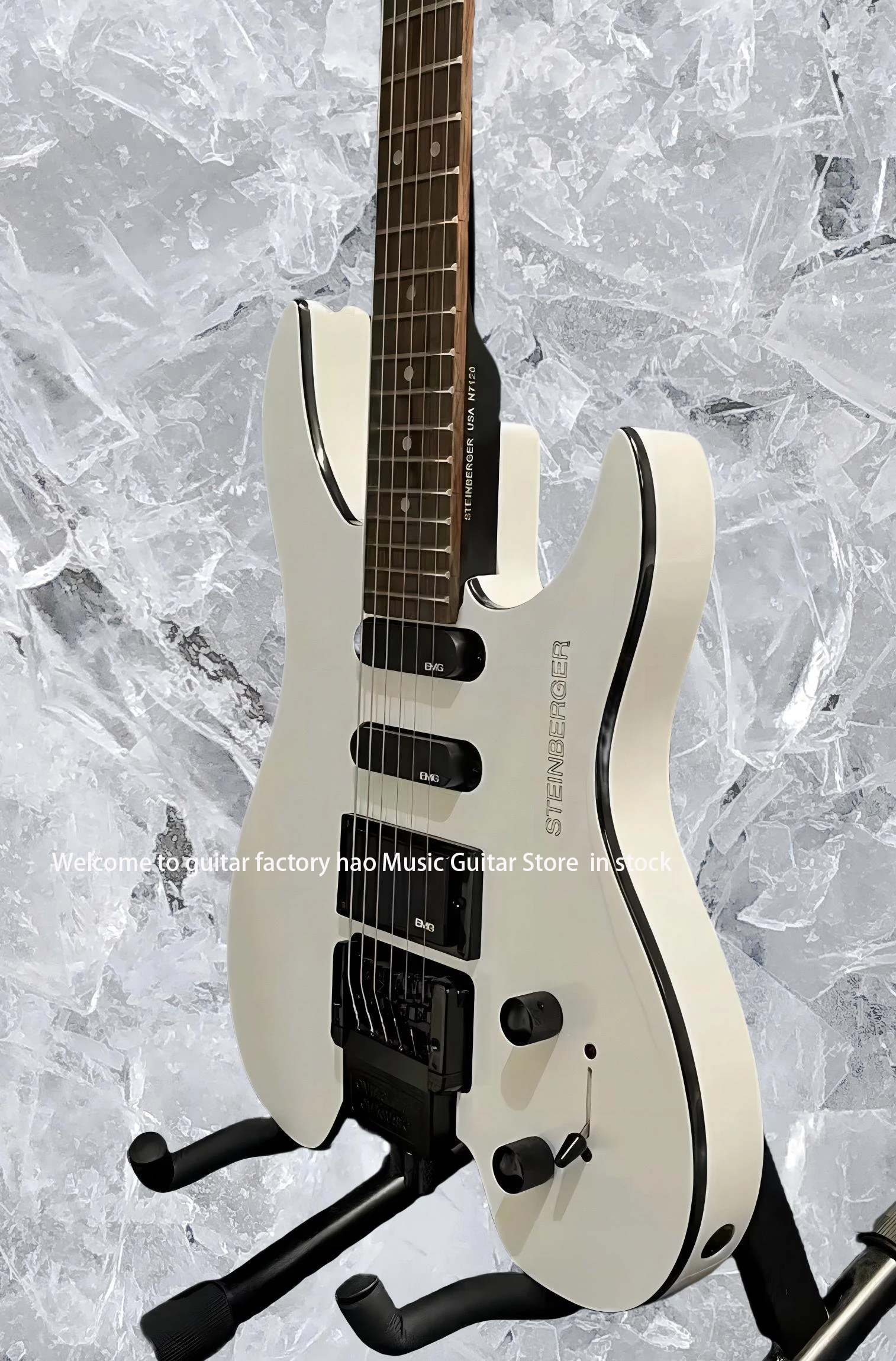 جيتار كهربائي بدون رأس، جسم الماهوجني، جسر فلويد روز تريمولو، جيتار مكون من 6 أوتار، إصدار شتاينبرغ