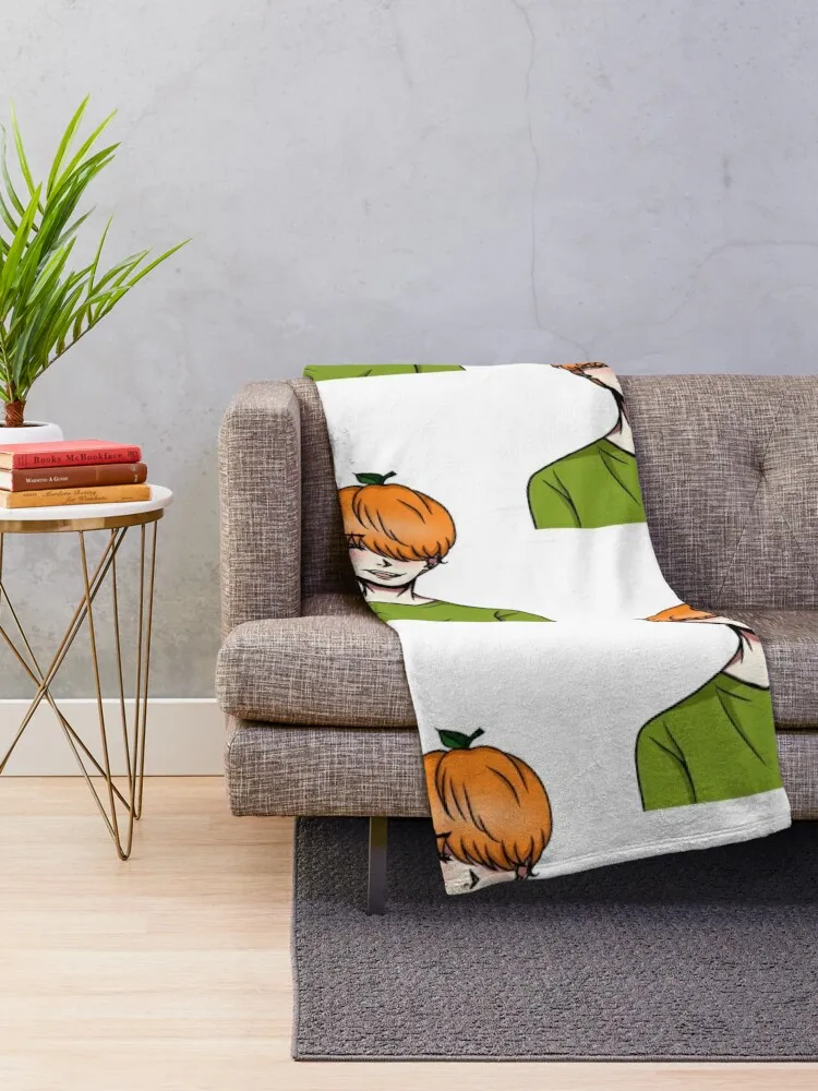 An anime guy wearing a green t-shirt with a tangerine on his head. Illustration for New Year and Christmas. Throw Blanket