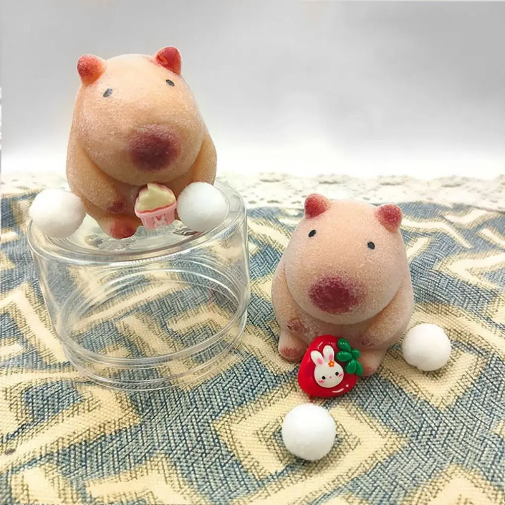 ピンクと白のカピバラの絞りおもちゃ、プラスチック製の減圧ストレス解消おもちゃ、ストレス解消漫画カピバラの反発おもちゃ