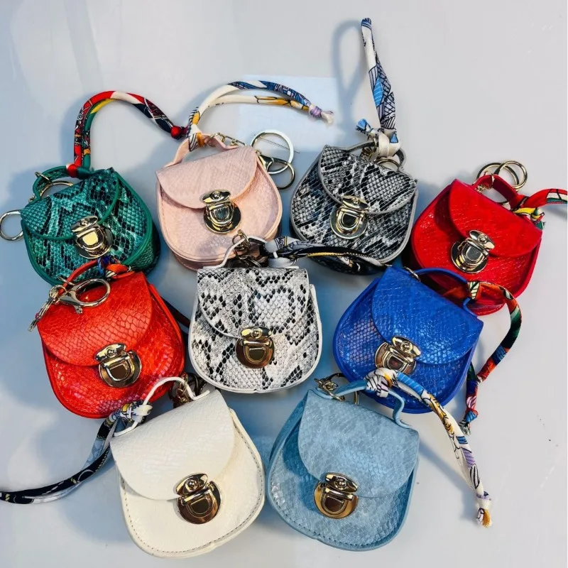 

Online celebrity new explosions Joker saddle bag coin purse pendant portable multifunctional bag pendant key chain. cute wallet