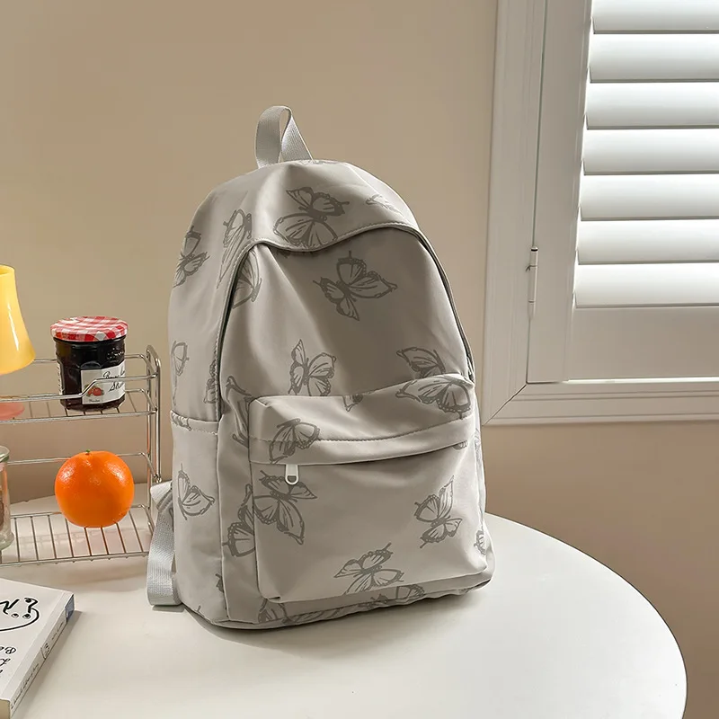 

2025 New! Creative Butterfly Print Backpack - Large-Capacity, Lightweight & Trendy for Junior High Students (Unisex)