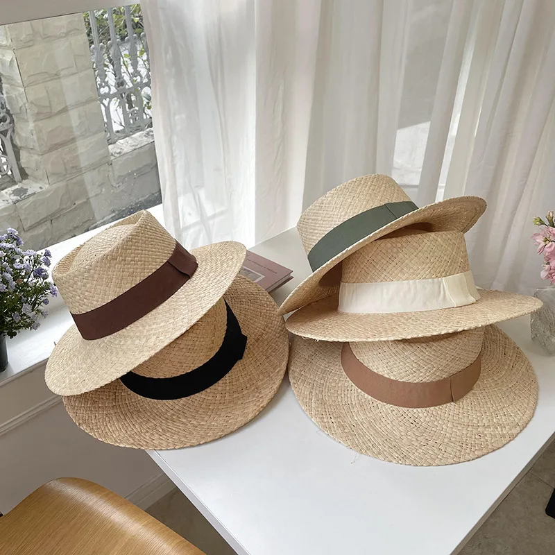 Pure hand-woven raffia flat cap simple fashion color ribbon women\'s hat outdoor beach travel sun hat wholesale spot