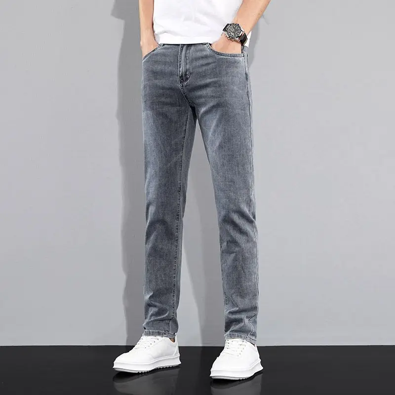 アメリカの男性のハイストリートダメージ加工ストレッチスキニージーンズパンツ秋冬ヴィンテージロングジーンズ因果多用途男性ズボン