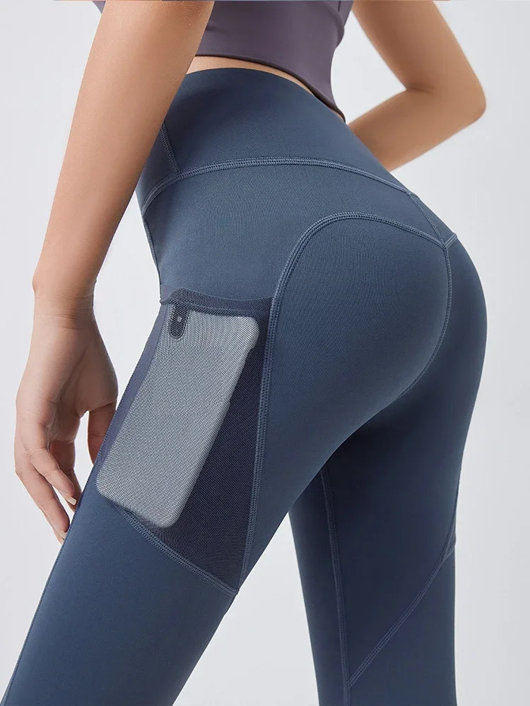 Pop กางเกงโยคะกระเป๋าสะโพกยก Bottoming Quick-drying เสื้อผ้าโยคะ Breathable ยืดตาข่ายกระเป๋าด้านข้างวิ่งออกกําลังกายกางเกง
