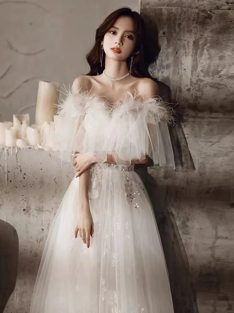 

Белое вечернее платье с открытыми плечами трапециевидной формы с перьями и вырезом лодочкой, аппликациями и блестками длиной до пола, вечерние платья для выпускного вечера Robe De Soiree