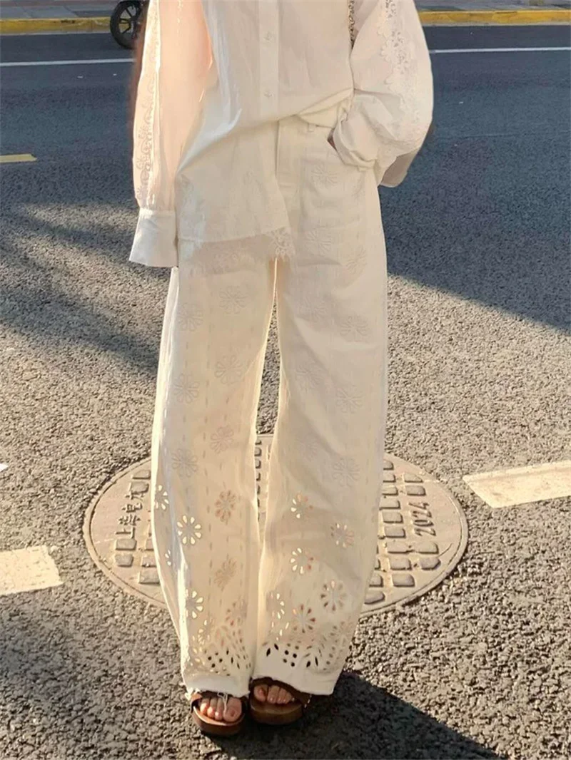Nova moda verão calças jeans feminino branco oco para fora bordado cintura alta casual solto calças retas jeans