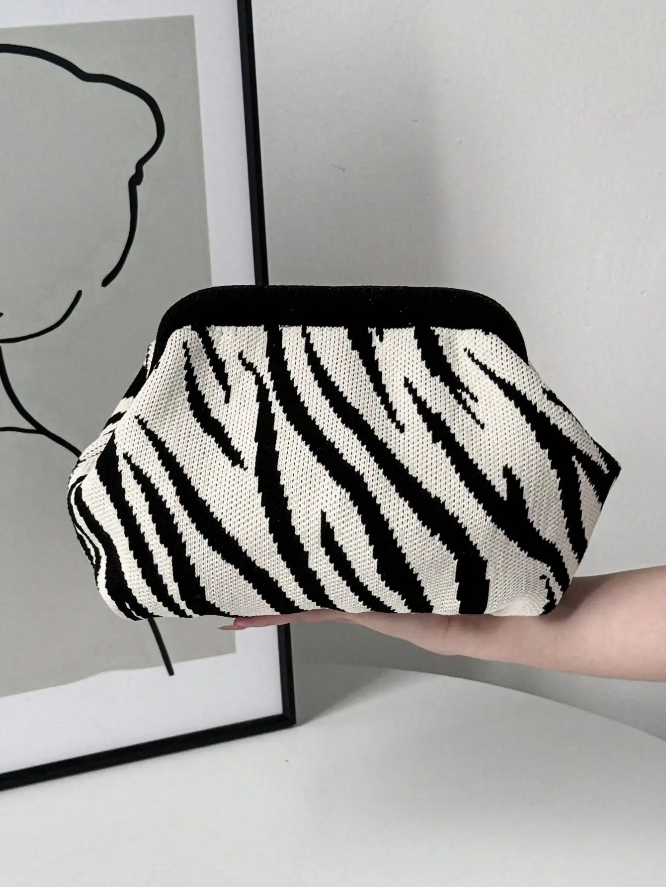 

Black and White Striped Knit Clutch Bag with Velvet Trim, Versatile for Evening or Day Use
