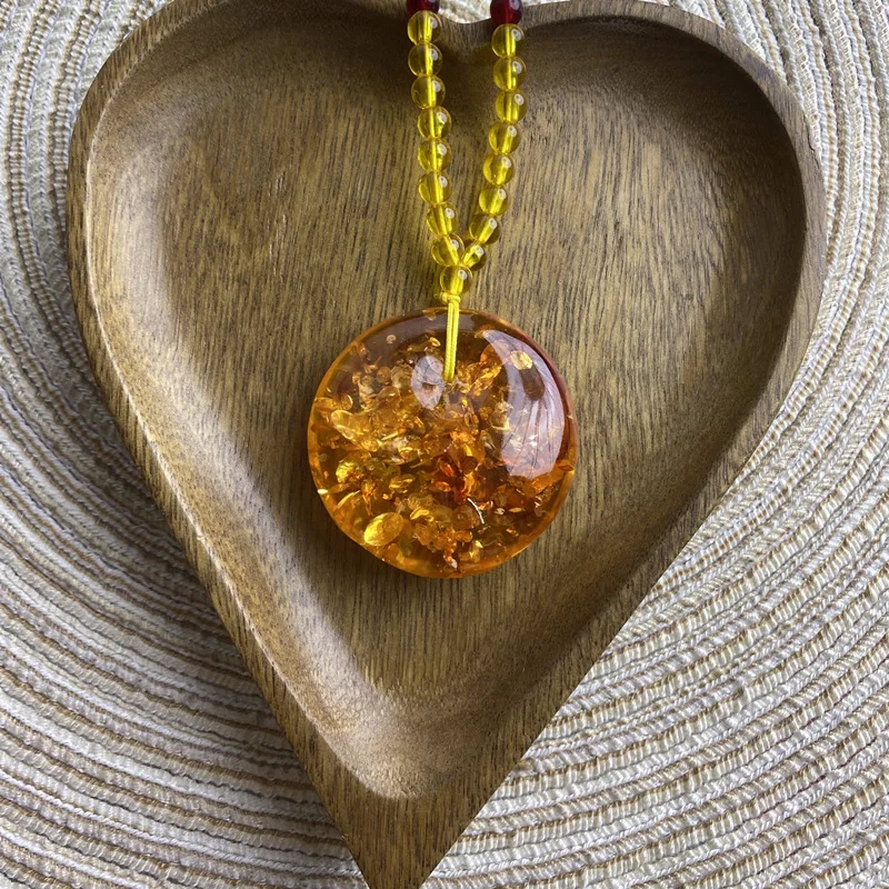 Wushipai imitation amber water drop pendant sweater chain, beeswax necklace, men's and women's promotional gifts, Yiwu small com