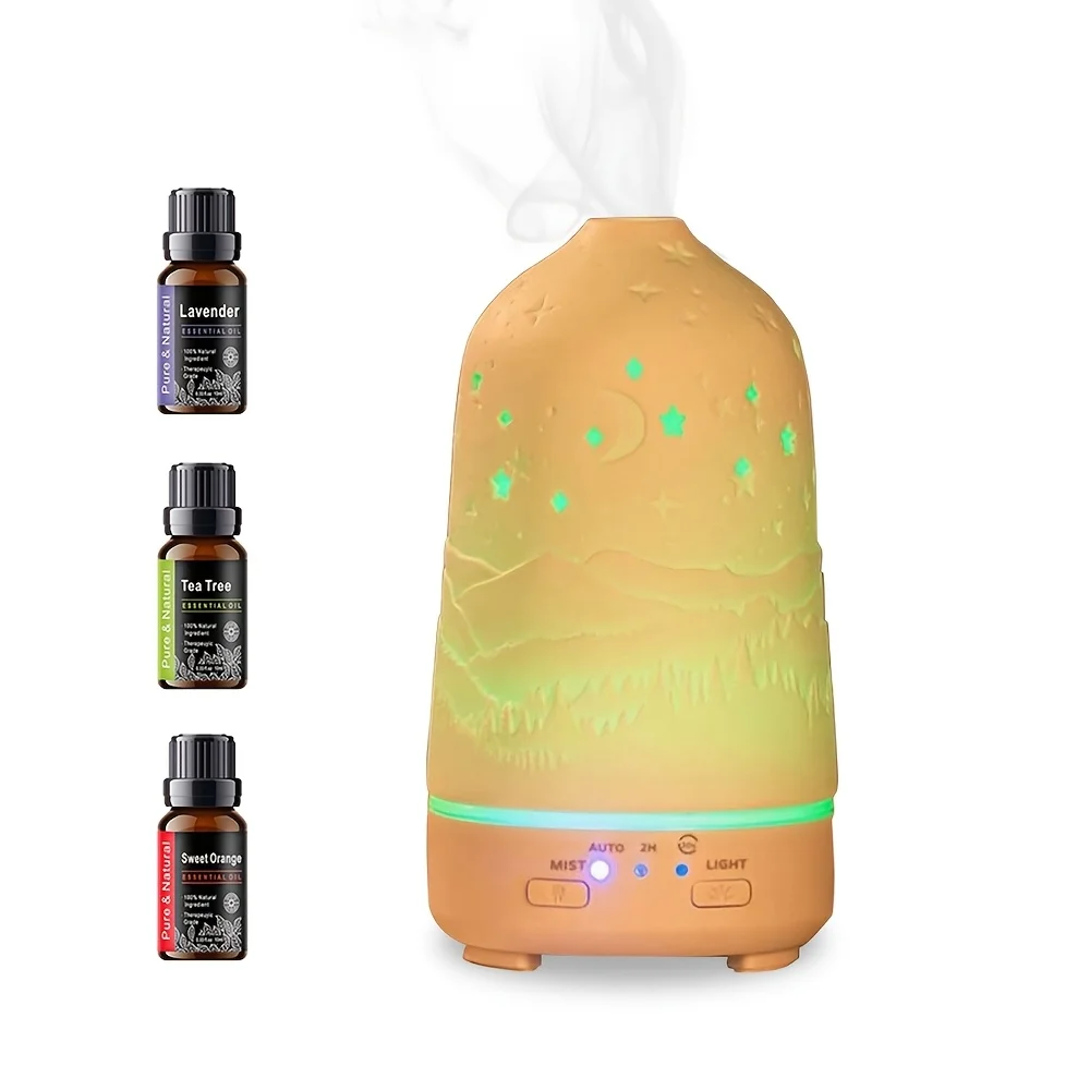 

Essential Oil Diffuser with 7-Color LED Lights 3.38oz Mist Humidifier Soothing Auto Shut-Off Includes 3 Free Oils