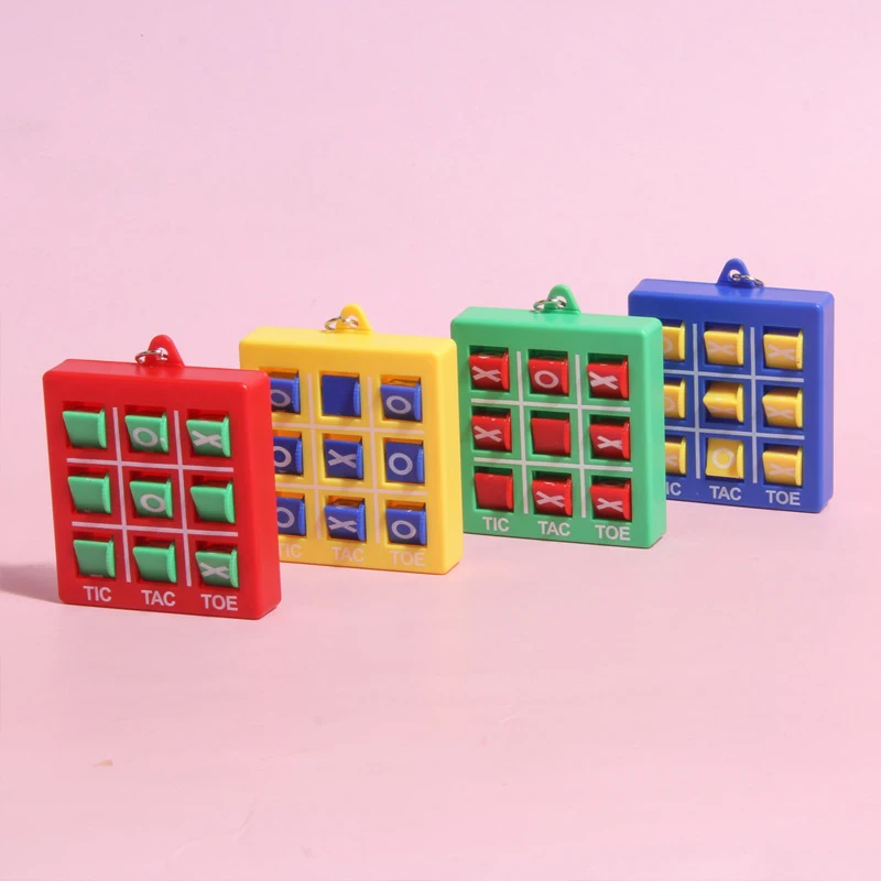 Mini llavero de juego de Tic-tac-toe de interés, rompecabezas colgante, descomprimir XO Spin, juego de ajedrez, juguetes para niños, 1 pieza