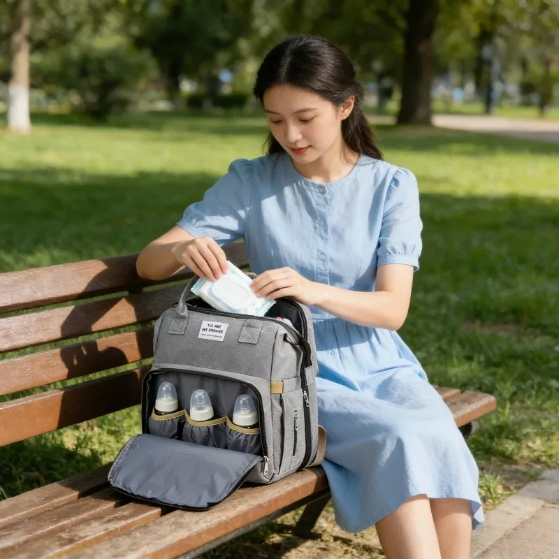 

Foldable Travel Mom Bag Sleepable Multi Functional Diaper Backpack with Bottle Pocket
