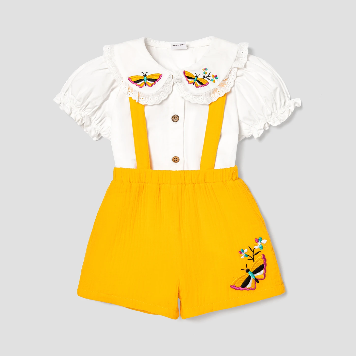 

PatPat 2pcs Baby Girl 100% Cotton Floral Embroidered Ruffle Collar Puff-sleeve Top and Solid Crepe Suspender Shorts Set