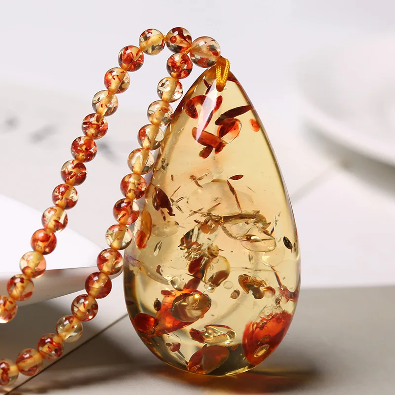 

Dropshipping Pendant Sweater Chain Amber Flower Amber Necklace Pendant Unisex Original Stone Two-tone Flower Amber Water Drop
