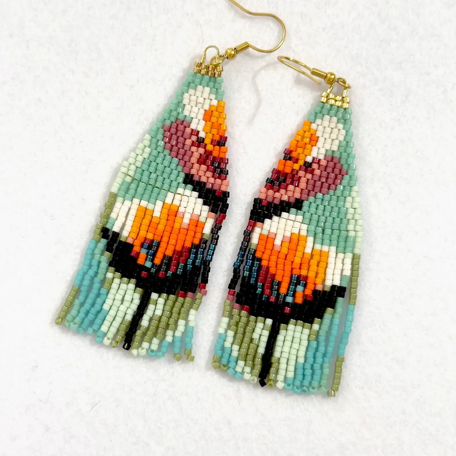 

ZGMXR Rice bead earrings Tassel Alloy Female Bohemia Symmetry Fashion Flower Creativity Pattern Hand-woven Beaded earrings