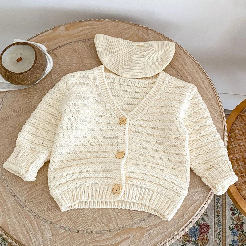 

New autumn baby clothing, 0-3 year old female baby, rice stripe thick needle cotton yarn knitted sweater jacket