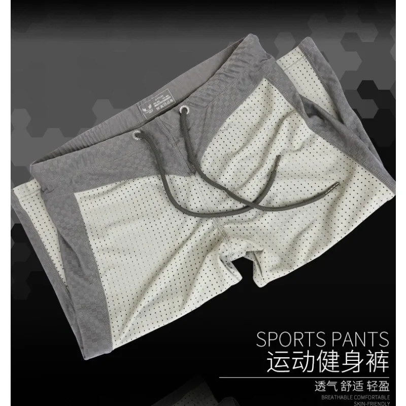 

Outdoor Korean version quick-drying pants men's elastic casual sweatpants cropped pants beach shorts medium pants wholesaleK0002