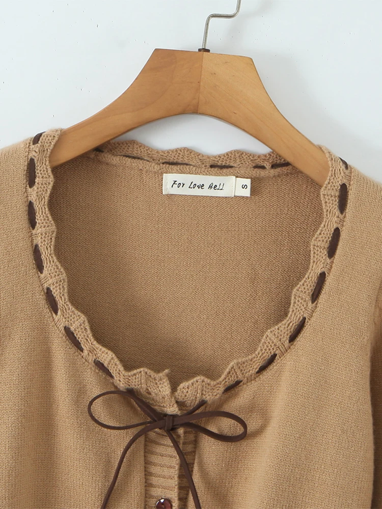 تشو ساو بيوتي 2025 المرأة موضة جديدة الحلو القوس تعادل شيك س الرقبة واحدة الصدر سترة مشغولة من الصوف مثير سليم كم طويل البلوزات #3