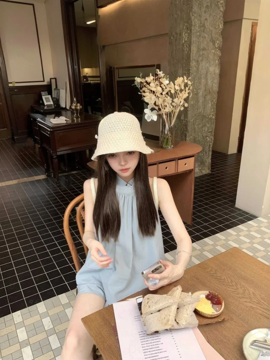 

Модный летний повседневный комплект 2025: свободный топ без рукавов и шорты в стиле «ленивый шик»