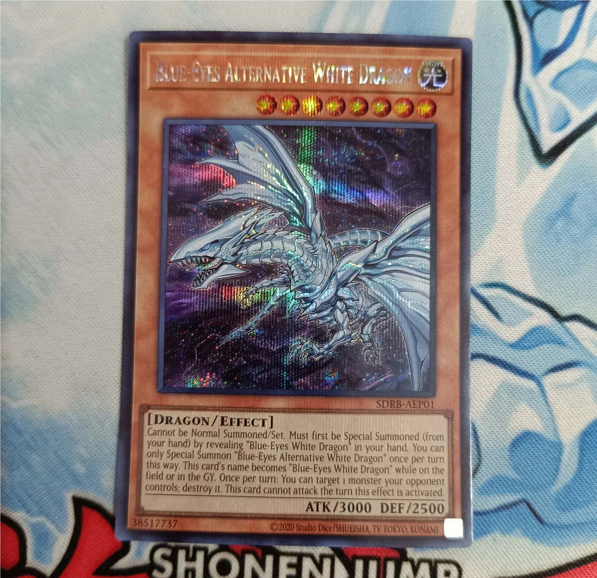 Yugioh KONAMI Duel Monsters SDRB-AE001 Blue-Eyes Alternative White Dragon Secret Rare Asian English Collection Mint Card