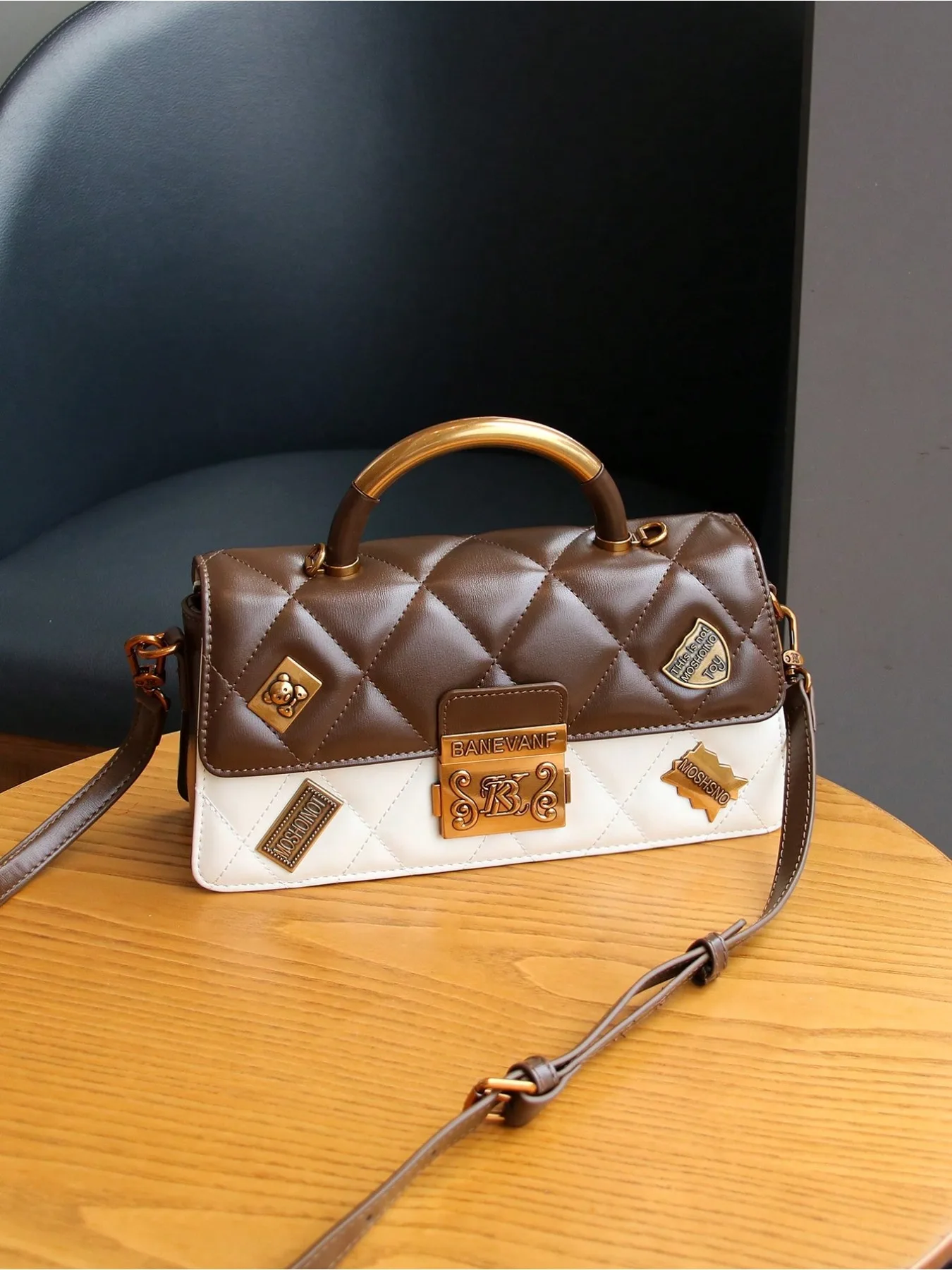 

Fashion commuting white-collar exquisite metal buckle hand-carried high-quality versatile handbag Boston bag