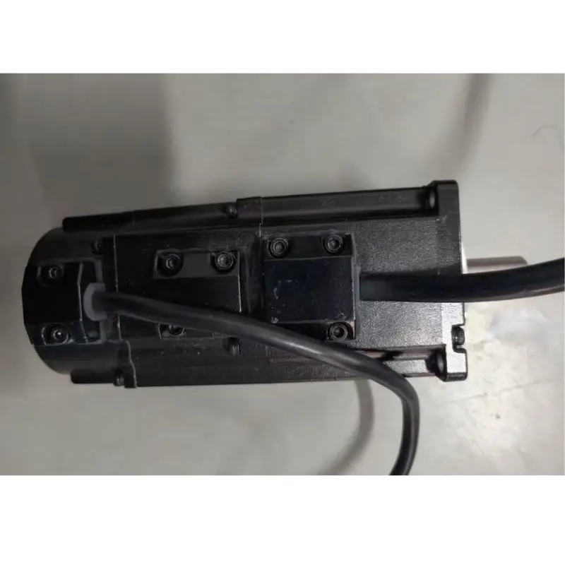 Used ECM-E2M-C10602S0 200W servo motor test Ok Quick delivery