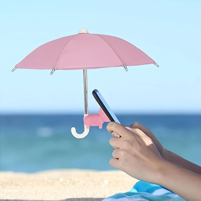 1 Pacote de Mini Guarda-Chuva para Celular com Suporte de Ventosa em Formato de Porco, Proteção Solar Antirreflexo, Escudo de Chuva para Smartphones. Construção Durável.