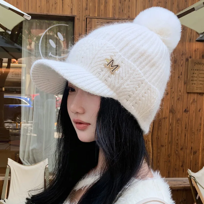 

2023 new M standard winter knitted baseball cap hairball for women warm sun hat South Korean bean hat fashion hat