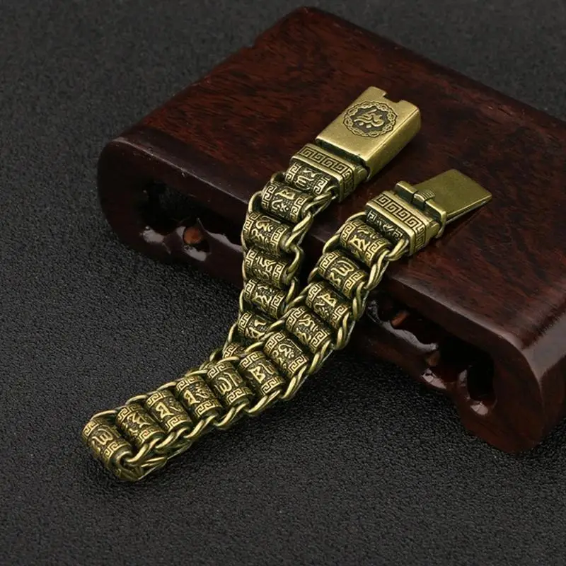 31BB Artisanal Crafted Brass Wrist Jewelry Showcasing Dateless Tibetan Symbolism