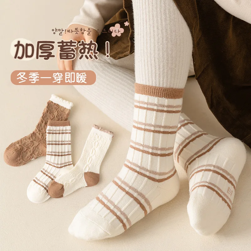 

Children's socks autumn and winter Korean sweet cartoon striped tube socks Class A warm girls trend versatile stockings
