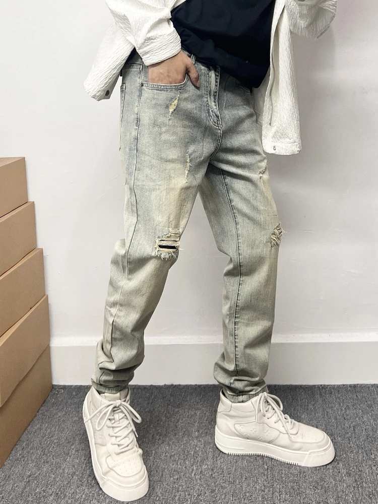 

Retro American Washed Hole Patching Poor Man's Jeans Men's Slim Nine Points Tight Elastic Ankle Pants Cotton Denim Jeans