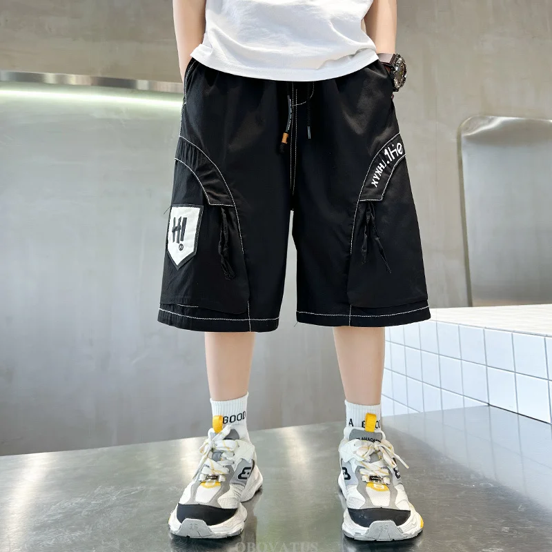 Pantaloncini cargo per bambini di nuova moda per ragazzi Pantaloncini estivi stile ampio Streetwear Bambino Adolescente Pantaloni al ginocchio in cotone casual 5-14 anni