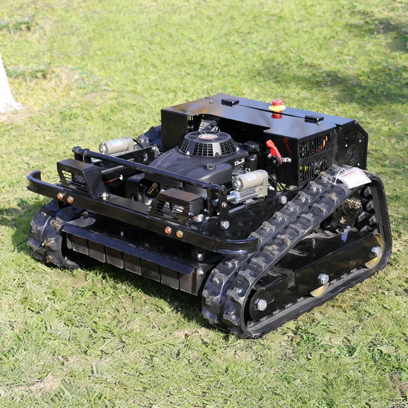 

Многофункциональная гусеничная газонокосилка с дистанционным управлением, предназначенная для прополки на склонах гор