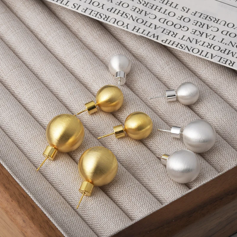 Fashion niche brushed hollow ball stud earrings light luxury high temperament Internet celebrity earrings earrings